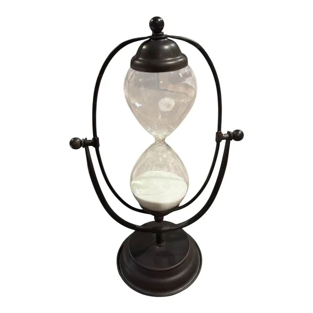 Decorative hourglass on a rotating metal base